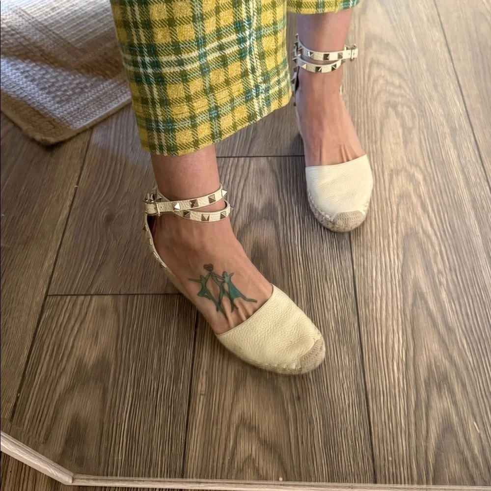 These are Valentino Garavani Rockstud textured-leather espadrille wedge heel